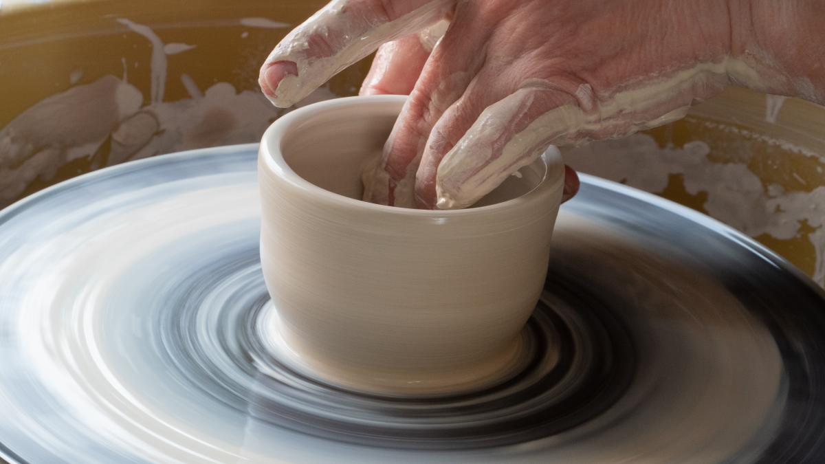 Hand throwing on a potters wheel