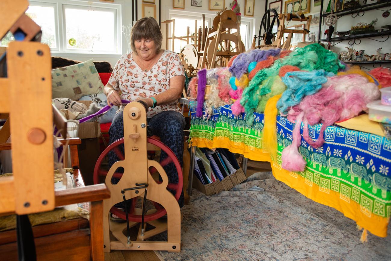 Christine Casey weaving in her studio