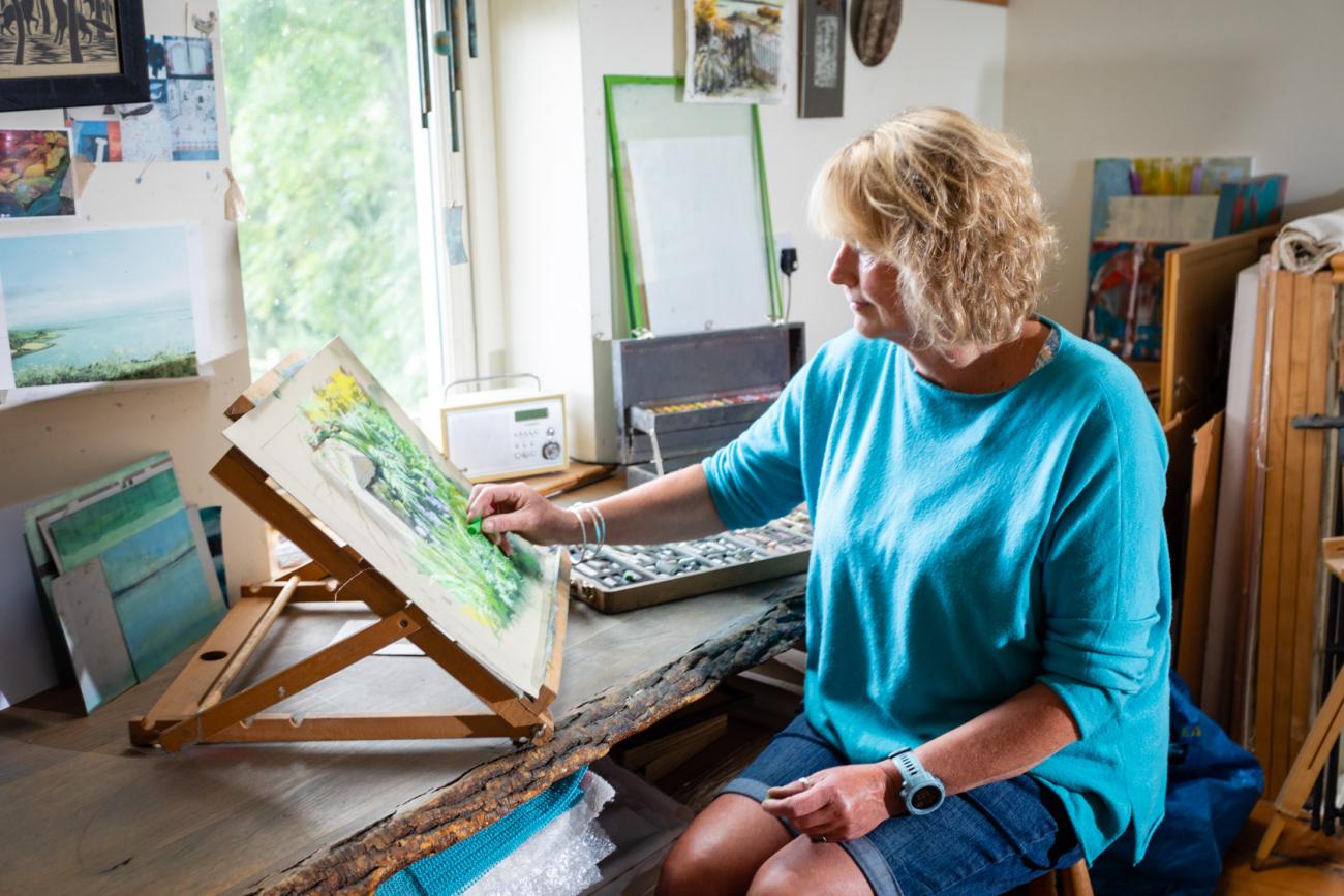 Sara Brown Artist working in her studio